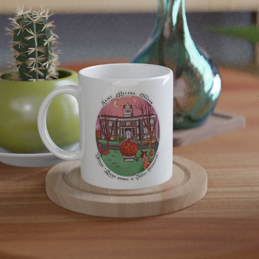 White mug with Halloweentown Exclusive Art by Bookhouse Girl on front